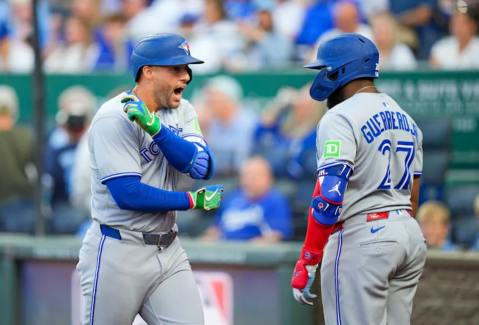 Toronto Blue Jays designated hitter George Springer (4) with first baseman Vladimir Guerrero Jr. (27) against the Kansas City Royals.© Jay Biggerstaff-Imagn Images