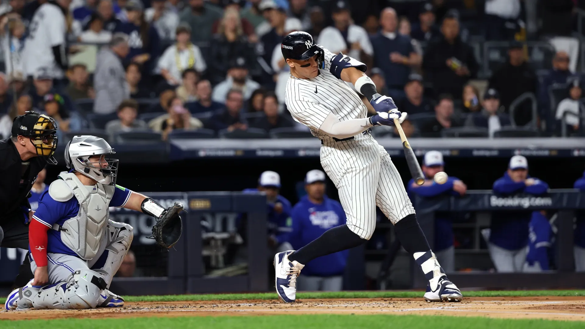 Aaron Judge #99 of the Yankees hits a single. Al Bello/Getty Images