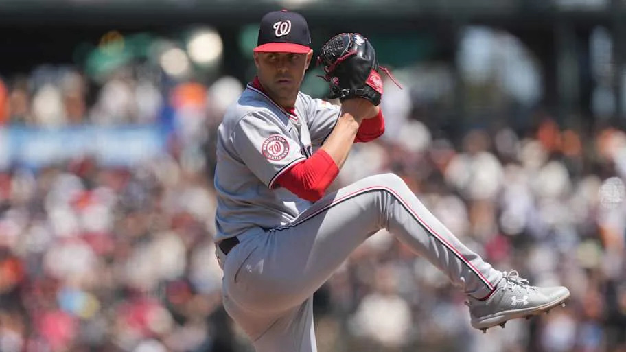 Mackenzie Gore delivers to the plate. 