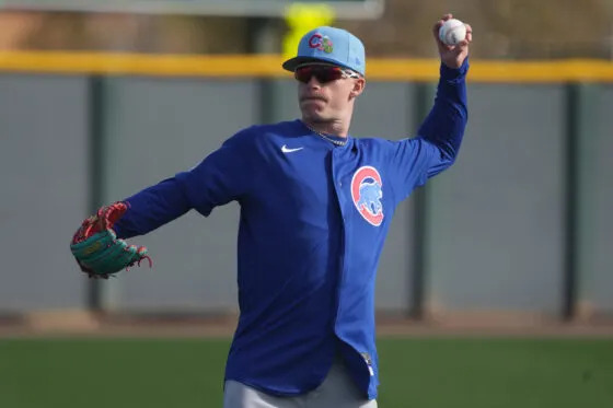 Chicago Cubs center fielder Pete Crow-Armstrong (4) works out during spring training camp at Sloan Park.