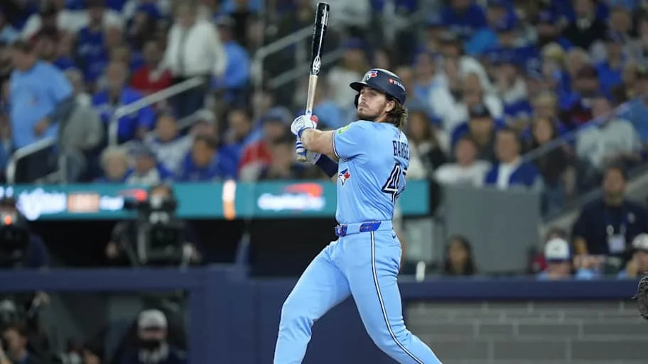 Toronto Blue Jays third baseman Addison Barger hits a double.