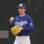 Los Angeles Dodgers pitcher Roki Sasaki (11) throws in the bullpen during spring training camp.