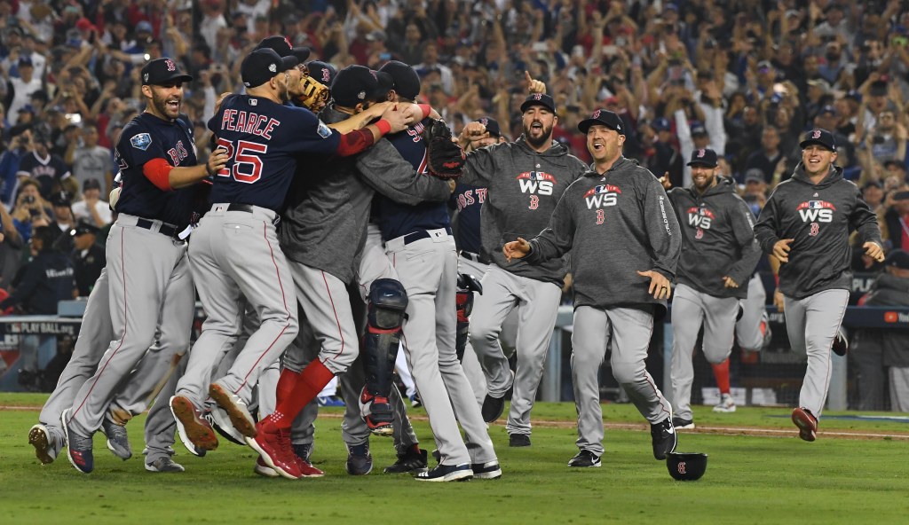 Boston Red Sox players celebrate after winning the 2018 World Series.
