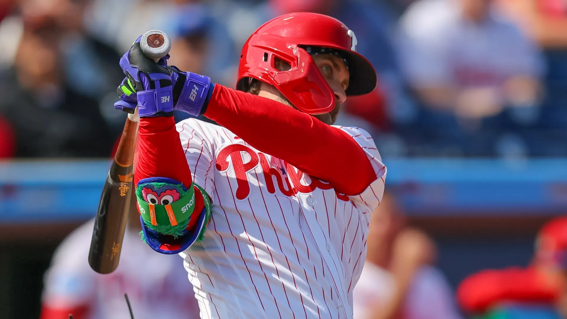 Bryce Harper #3 of the Phillies swings during an at bat against the Pirates. Mike Carlson/Getty Images