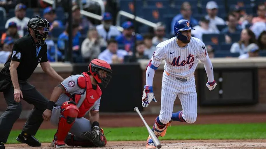 New York Mets Brandon Nimmo dropping a baseball bat and runnin