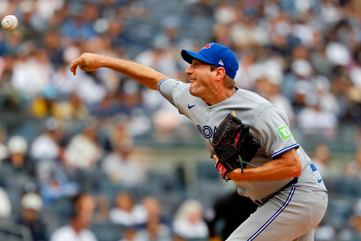 Toronto Blue Jays pitcher Max Scherzer (31) throws a pitch during an MLB baseball game.