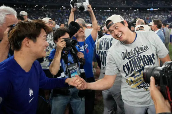 Nov 1, 2025; Toronto, Ontario, CAN; Los Angeles Dodgers two-way player Shohei Ohtani (17) celebrates with pitcher Yoshinobu Yamamoto (18) after defeating the Toronto Blue Jays during game seven of the 2025 MLB World Series at Rogers Centre. Mandatory Credit: John E. Sokolowski-Imagn Images