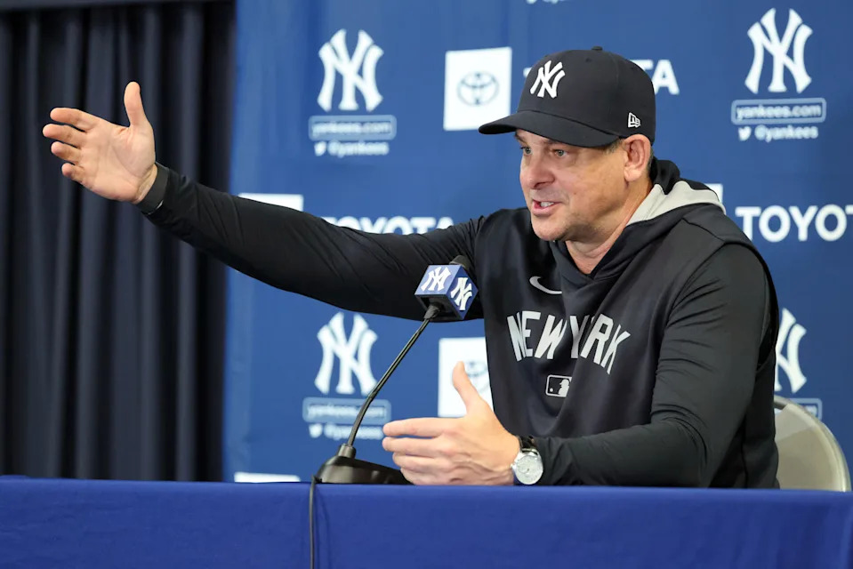 Feb 11, 2025; Tampa, FL, USA; New York Yankees manager Aaron Boone talks with media during a press conference as spring training starts at George M. Steinbrenner Field. Mandatory Credit: Kim Klement Neitzel-Imagn Images
