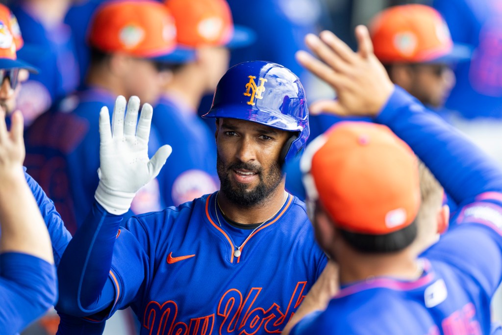 Mets' Marcus Semien (10) celebrates a solo home run in the third inning against the Houston Astros during Spring Training at Cacti Park of the Palm Beaches, Thursday, Feb. 26, 2026, in West Palm Beach, FL.