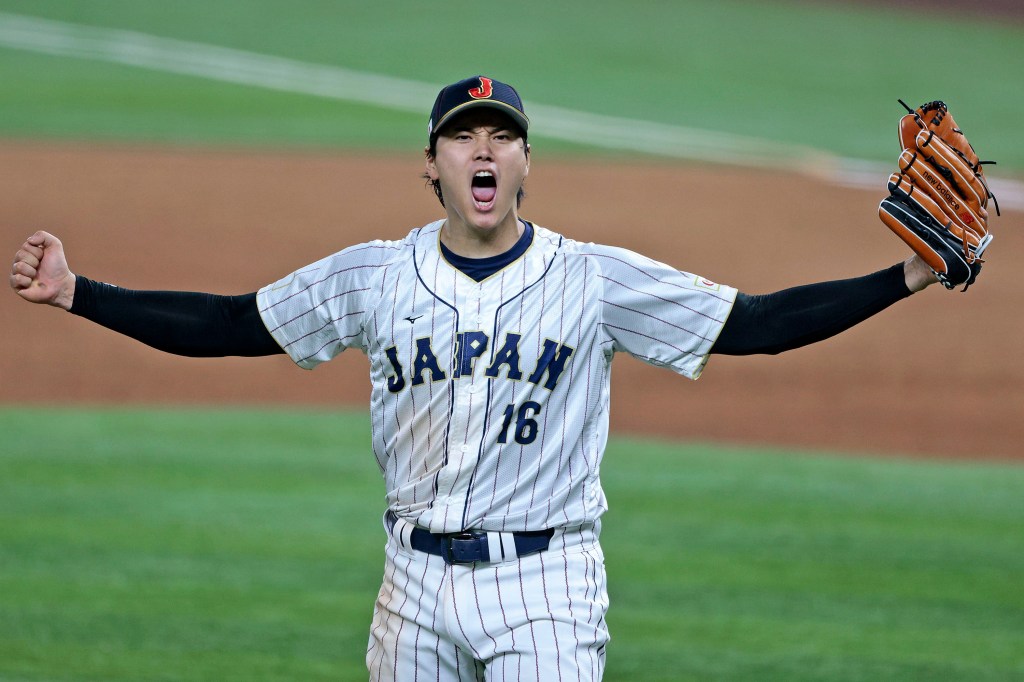 Shohei Ohtani #16 of Team Japan reacts after the final out in the top of the 9th inning to defeat Team USA 3-2 during World Baseball Classic Championship at loanDepot park on March 21, 2023 in Miami, Florida.