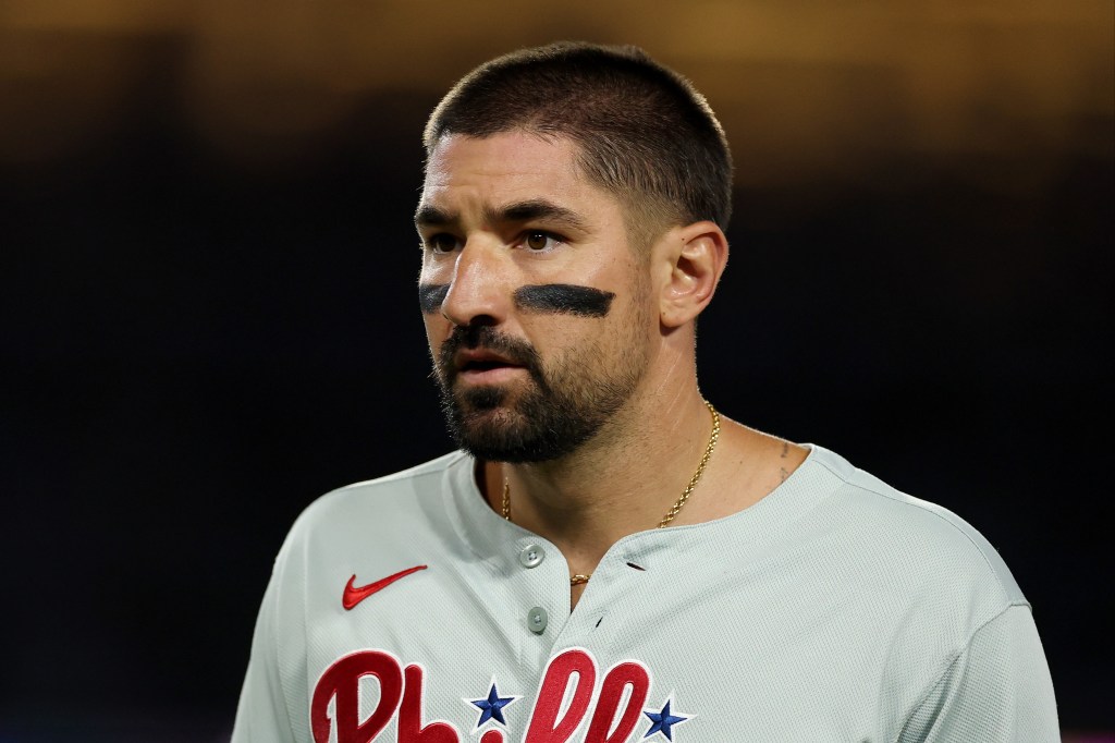 Nick Castellanos #8 of the Philadelphia Phillies looks on against the Los Angeles Dodgers at Dodger Stadium on September 17, 2025 in Los Angeles, California.