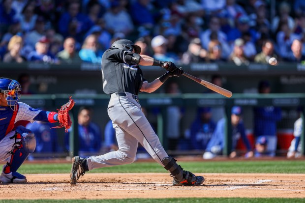 Chicago White Sox second baseman Sam Antonacci (92) hits a two-run homer in the second inning against the Chicago Cubs during the Cubs and White Sox first spring training game of the year at Sloan Park Friday Feb. 20, 2026 in Mesa, Ariz. (Armando L. Sanchez/Chicago Tribune)