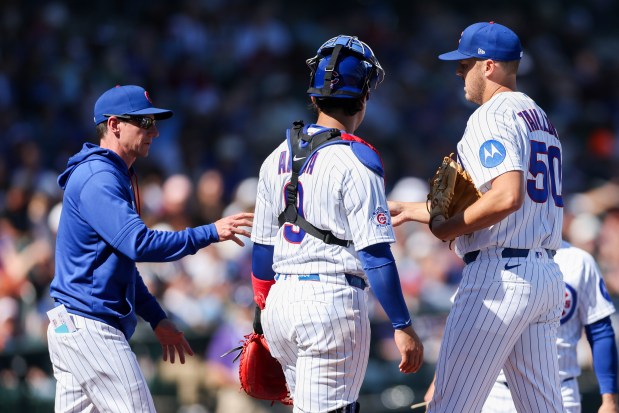 Chicago Cubs manager Craig Counsell (11) takes out Chicago Cubs pitcher Jameson Taillon (50) in the second inning during the Cubs and White Sox first spring training game of the year at Sloan Park Friday Feb. 20, 2026 in Mesa, Ariz. (Armando L. Sanchez/Chicago Tribune)