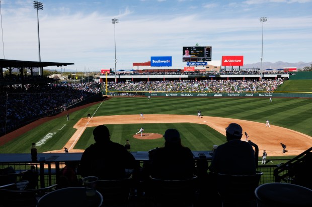Fans watch the Chicago White Sox play the Chicago Cubs in the fourth inning during the Cubs and White Sox first spring training game of the year at Sloan Park Friday Feb. 20, 2026 in Mesa, Ariz. (Armando L. Sanchez/Chicago Tribune)