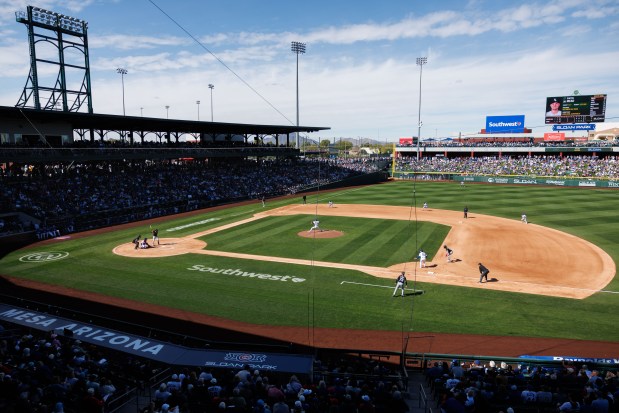 Fans watch the Chicago White Sox play the Chicago Cubs in the fourth inning during the Cubs and White Sox first spring training game of the year at Sloan Park Friday Feb. 20, 2026 in Mesa, Ariz. (Armando L. Sanchez/Chicago Tribune)