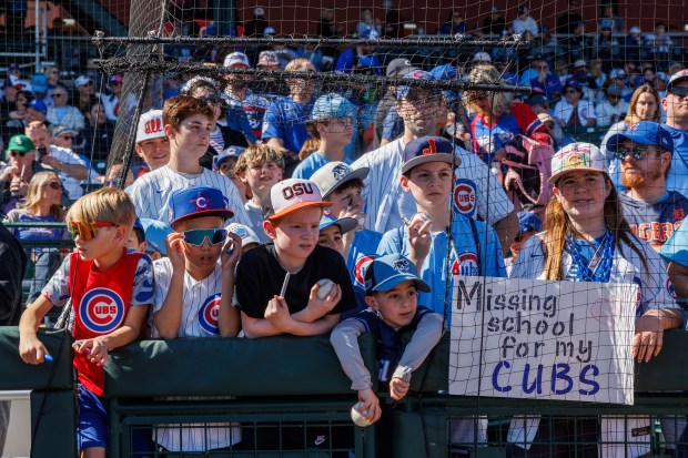 Fans wait for autographs before the Chicago Cubs play the Chicago White Sox during the Cubs and White Sox first spring training game of the year at Sloan Park Friday Feb. 20, 2026 in Mesa, Ariz. (Armando L. Sanchez/Chicago Tribune)