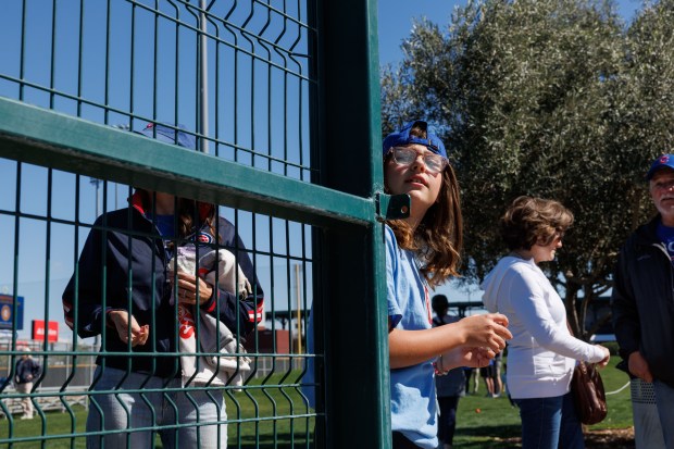 Audrey Beal, 10, waits for players autographs before the Chicago Cubs play against the Chicago White Sox during the Cubs and White Sox first spring training game of the year at Sloan Park Friday Feb. 20, 2026 in Mesa, Ariz. (Armando L. Sanchez/Chicago Tribune)