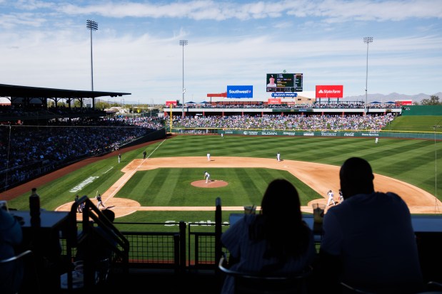 Fans watch the Chicago White Sox play the Chicago Cubs in the fourth inning during the Cubs and White Sox first spring training game of the year at Sloan Park Friday Feb. 20, 2026 in Mesa, Ariz. (Armando L. Sanchez/Chicago Tribune)