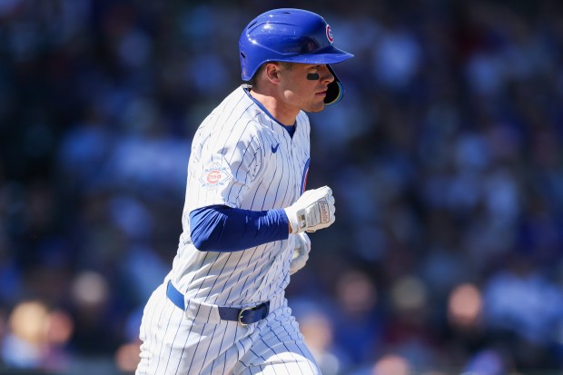Chicago Cubs right fielder Matt Shaw runs to first base after hitting a single during the first inning against the Texas Rangers in a Cactus League game at Sloan Park on Saturday, Feb. 21, 2026, in Mesa, Ariz. (Armando L. Sanchez/Chicago Tribune)
