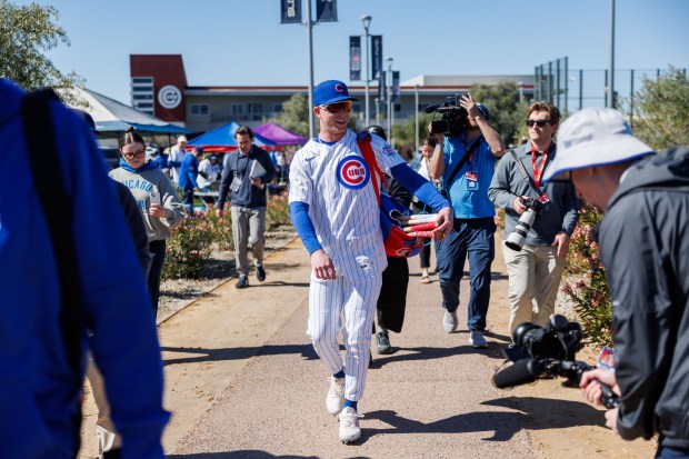 Chicago Cubs center fielder Pete Crow-Armstrong (4) walks to the stadium before playing the Texas Rangers in a Cactus League game at Sloan Park Saturday Feb. 21, 2026 in Mesa, Ariz. (Armando L. Sanchez/Chicago Tribune)