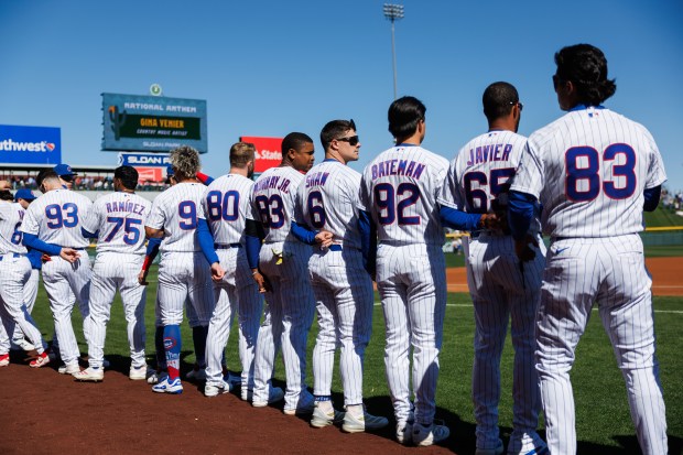 Chicago Cubs right fielder Matt Shaw (6) stands with other players during the national anthem before the Cubs play the Texas Rangers in a Cactus League game at Sloan Park Saturday Feb. 21, 2026 in Mesa, Ariz. (Armando L. Sanchez/Chicago Tribune)
