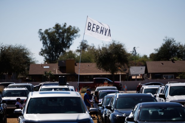 A Berwyn flag sits among tailgaters outside the ballpark before the Chicago Cubs play the Texas Rangers in a Cactus League game at Sloan Park Saturday Feb. 21, 2026 in Mesa, Ariz. (Armando L. Sanchez/Chicago Tribune)