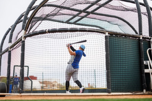 Seiya Suzuki hits during batting practice during the first day of the Cubs full-squad workout at spring training at Sloan Park on Monday, Feb. 16, 2026, in Mesa, Ariz. (Armando L. Sanchez/Chicago Tribune)