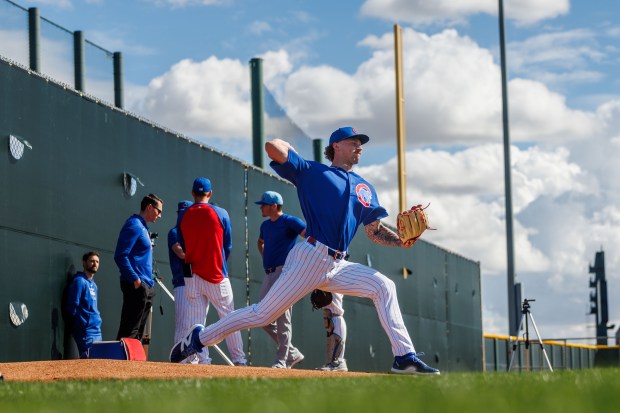Pitcher Jaxon Wiggins throws in the bullpen area during spring training at Sloan Park Tuesday Feb. 17, 2026 in Mesa, Ariz. (Armando L. Sanchez/Chicago Tribune)
