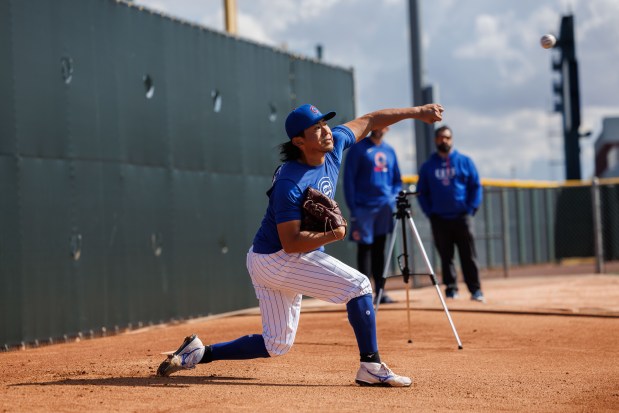 Pitcher Shota Imanaga throws in the bullpen area during spring training at Sloan Park on Tuesday, Feb. 17, 2026, in Mesa, Ariz. (Armando L. Sanchez/Chicago Tribune)
