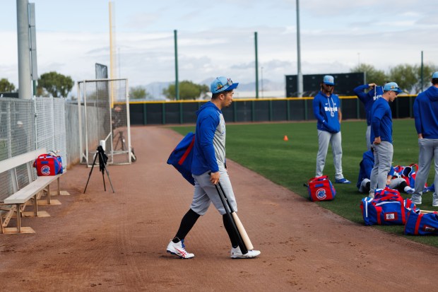 Cubs right fielder Seiya Suzuki walks to a Sloan Park practice field during spring training on Feb. 18, 2026, in Mesa, Ariz. (Armando L. Sanchez/Chicago Tribune)