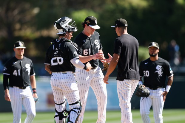 White Sox manager Will Venable talks to pitcher Mike Vasil during the second inning against the Brewers in a Cactus League game at Camelback Ranch on Sunday, Feb. 22, 2026, in Glendale, Ariz. (Armando L. Sanchez/Chicago Tribune)