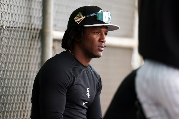 White Sox outfielder Luisangel Acuña sits in the dugout during spring training at Camelback Ranch on Feb. 18, 2026, in Glendale, Ariz. (Eileen T. Meslar/Chicago Tribune)