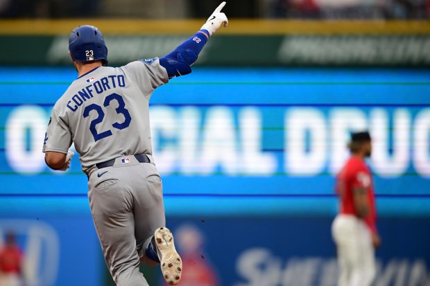 Los Angeles Dodgers' Michael Conforto runs the bases after hitting a solo home run against the Cleveland Guardians on Tuesday, May 27, 2025, in Cleveland. (AP Photo/David Dermer)