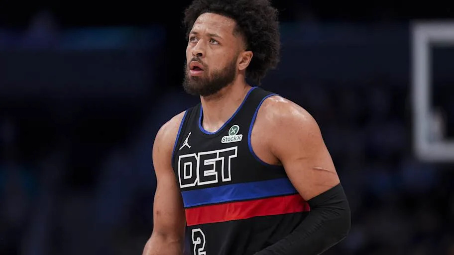 Detroit Pistons guard Cade Cunningham walks down the floor during a game.