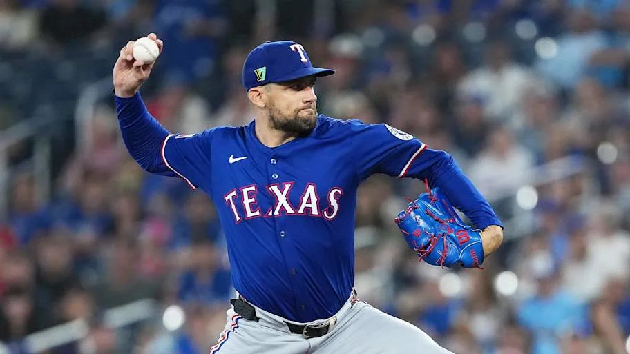 Texas Rangers pitcher Nathan Eovaldi throws a pitch.
