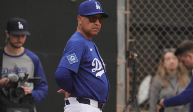 Feb 13, 2026; Glendale, AZ, USA; Los Angeles Dodgers manager Dave Roberts (30) watches from the bullpen during spring training camp. Mandatory Credit: Rick Scuteri-Imagn Images