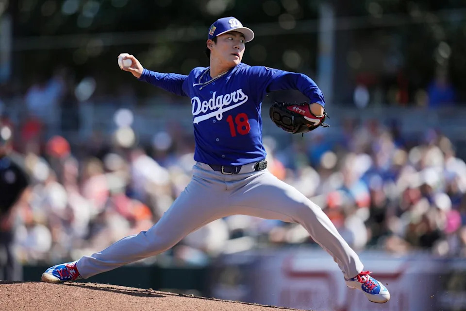 Dodgers starting pitcher Yoshinobu Yamamoto throws during the first inning against the San Francisco Giants on Friday.