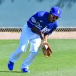 Los Angeles Dodgers outfielder Terrance Gore fields a ball during a workout at Camelback Ranch on Feb 18, 2020.