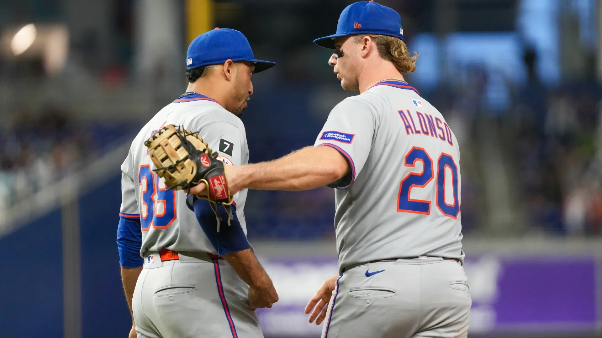 Pete Alonso with the Mets congratulates pitcher Edwin Díaz after finishing out a game. Calvin Hernandez/Getty Images