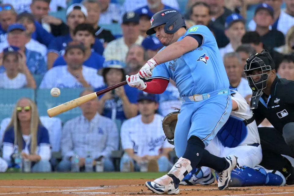 Toronto Blue Jays catcher Alejandro Kirk (30) hits against the Los Angeles Dodgers.© Jayne Kamin-Oncea-Imagn Images