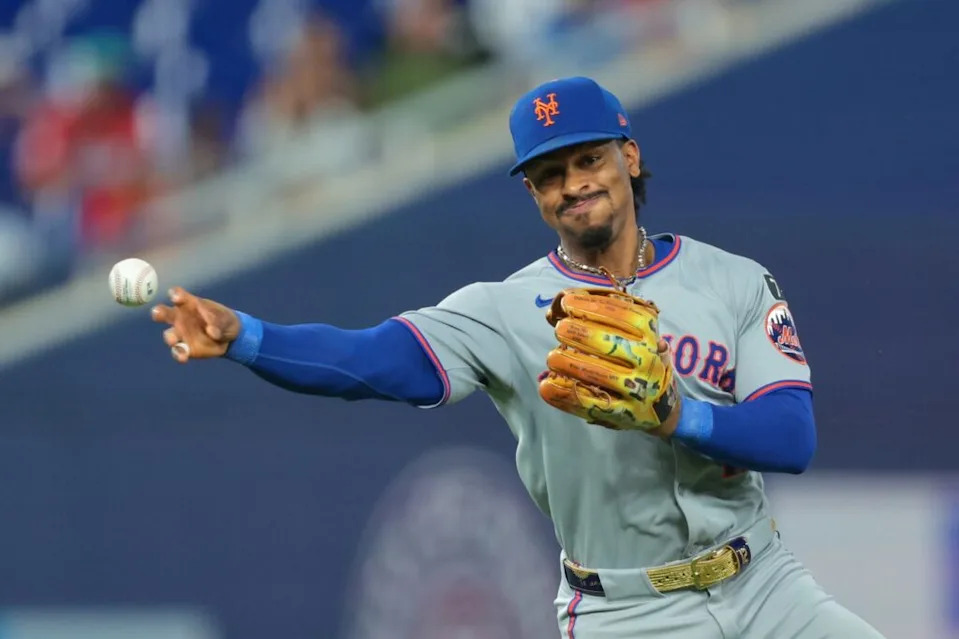 Sep 28, 2025; Miami, Florida, USA; New York Mets shortstop Francisco Lindor (12) throws to first base to retire Miami Marlins shortstop Otto Lopez (not pictured) during the second inning at loanDepot Park. Mandatory Credit: Sam Navarro-Imagn Images
