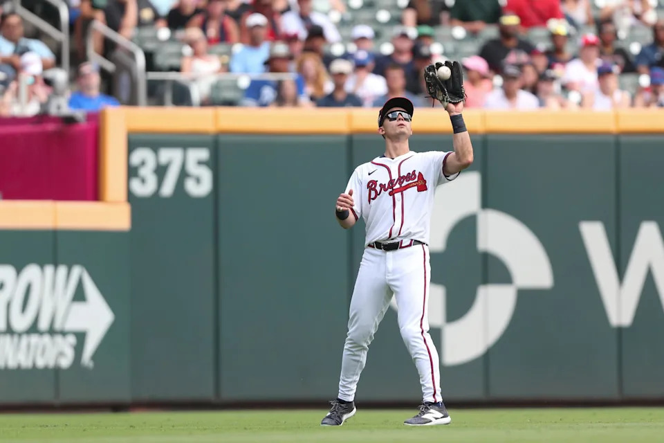Jun 29, 2025; Cumberland, Georgia, Atlanta Braves right fielder Stuart Fairchild (17) catches the ball for an out during a game against the Philadelphia Phillies during the ninth inning at Truist Park. Mandatory Credit: Mady Mertens-Imagn Images