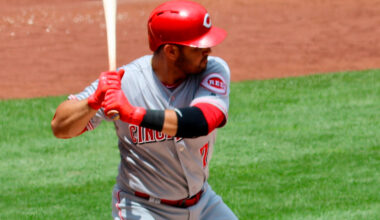 How much did adding a slugger improve the Reds offense?