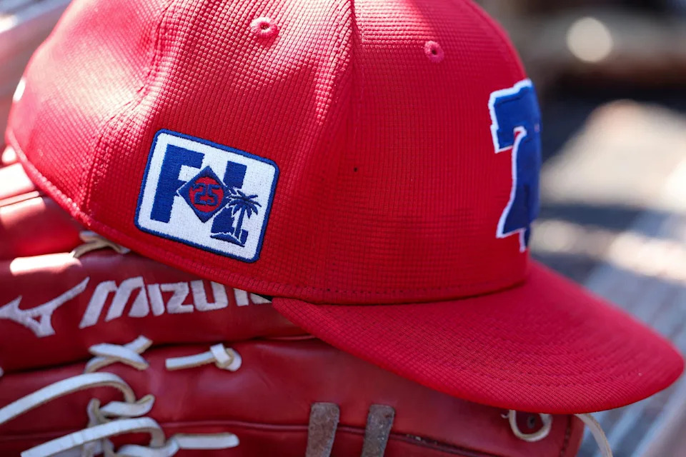 Feb 26, 2025; Dunedin, Florida, USA; Philadelphia Phillies outfielder Gabriel Rincones Jr. (85) hat sits in the dugout against the Toronto Blue Jays in the fifth inning during spring training at TD Ballpark. Mandatory Credit: Nathan Ray Seebeck-Imagn Images