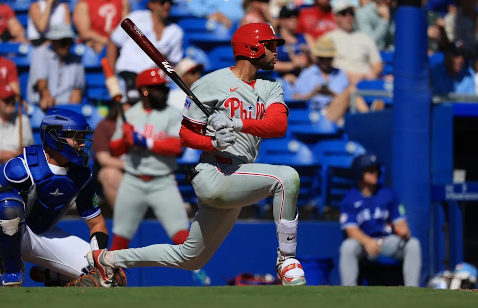 Feb 21, 2026; Dunedin, Florida, USA; Philadelphia Phillies outfielder Justin Crawford (80) singles during the fifth inning against the Toronto Blue Jays at TD Ballpark. Mandatory Credit: Kim Klement Neitzel-Imagn Images