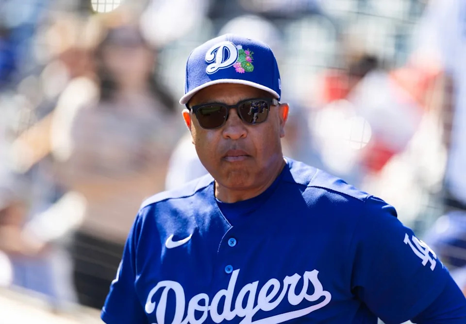 Los Angeles Dodgers manager Dave Roberts against the Los Angeles Angels during a spring training game at Tempe Diablo Stadium. Mark J. Rebilas-Imagn Images