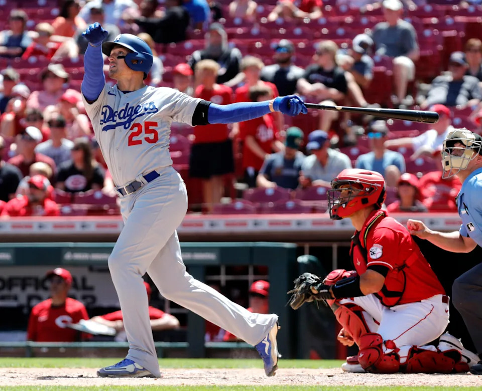 Jun 23, 2022; Cincinnati, Ohio, USA; Los Angeles Dodgers pinch hitter Trace Thompson hits a solo home run against the Cincinnati Reds during the ninth inning at Great American Ball Park. Mandatory Credit: David Kohl-USA TODAY Sports