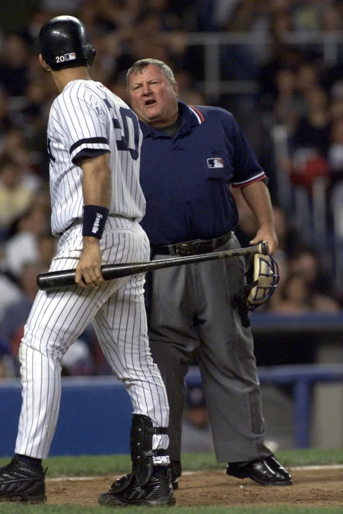 Umpire Bruce Froemming has words with Jorge Posada after the Yankees catcher was called out on strikes. New York Post