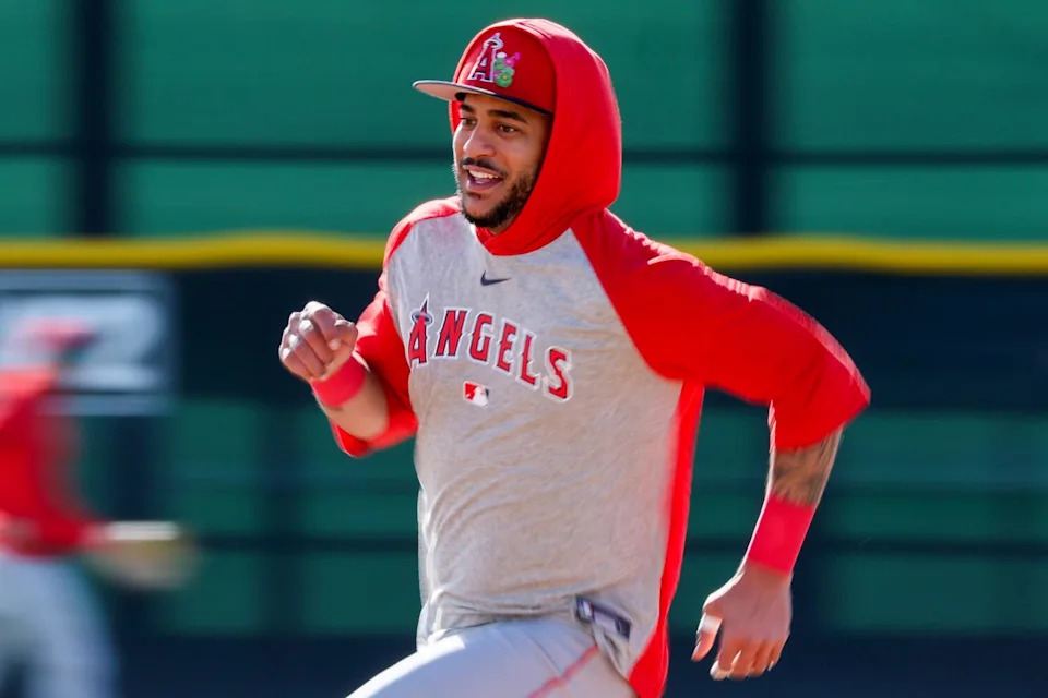 Oswald Peraza rounds the bases for a practice drill.