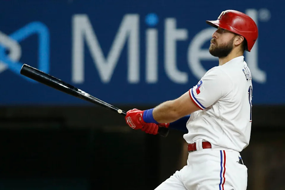 Jul 27, 2021; Arlington, Texas, USA; Texas Rangers right fielder Joey Gallo (13) hits a three run home run in the fourth inning against the Arizona Diamondbacks at Globe Life Field. Mandatory Credit: Tim Heitman-USA TODAY Sports